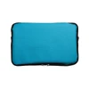 A cooler bag in a bright turquoise color with a zippered closure.