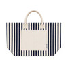 A striped tote bag featuring navy blue and cream colours with two handles and a front pocket. It has a logo.