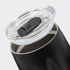 A drink bottle with a sleek black exterior and transparent lid featuring a sliding opening mechanism.
