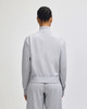 A grey French Terry women's full-zip jacket, viewed from the back, featuring a simple design and no visible branding.