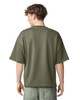 A unisex oversized boxy top in olive green, featuring a simple design and a logo on the back.