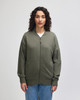 A unisex bomber jacket in olive green featuring a zip front and a side pocket. It has a branding logo.