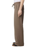 Wide leg pants in brown French terry fabric. Features a drawstring waist and side pockets. Appears on a mannequin.
