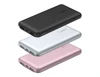 A set of three power banks in black, silver, and rose gold, featuring USB ports and a logo on each.