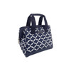 A navy insulated lunch bag with a white geometric pattern and short handles, featuring a logo on the side.