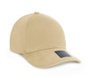 A beige cotton/spandex cap with a curved visor and a logo on the side.