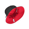 A reversible bucket hat featuring a black exterior and a red interior, with an adjustable toggle and branding.
