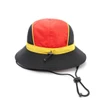 A panelled bucket hat featuring red, yellow, and black colours, with a chin rope for secure fit.