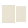 Two cotton tea towels in a light beige colour, one larger and one smaller, both featuring a brand logo.