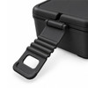 A black lunchbox featuring a detachable handle and a secure lid is prominently displayed. It has a sleek design.