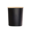 A black container with a bamboo lid. It has a sleek design suitable for home decor.