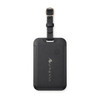 A black luggage tag tracker with a strap and a logo on the front, featuring a power button.