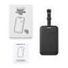 A black luggage tag tracker with a strap, accompanied by an instruction manual and packaging.