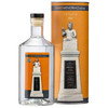 A glass bottle of gin with a custom label, accompanied by a cylindrical packaging in orange and grey.