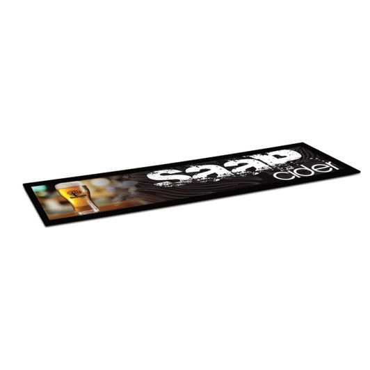 A large black counter mat featuring a drink glass and a logo. The design includes white and silver elements.