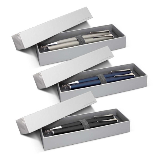 A pen set featuring three metal pens in grey, blue, and black, packaged in a sleek grey box with a logo.
