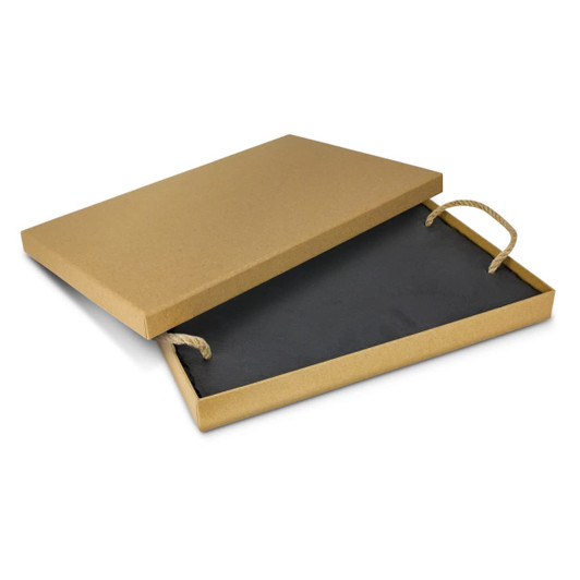 A slate serving board in a brown box with handles, featuring a black interior. The box is open, displaying the board inside.