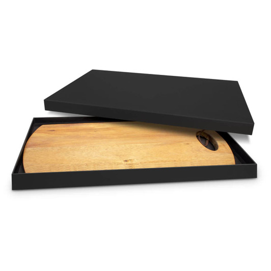 A wooden serving board with a round handle inside a black box. The board features a natural wood finish.
