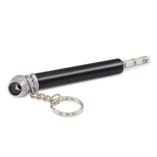 A black tyre pressure gauge key ring with a metal key ring attachment and a measuring scale on one end.