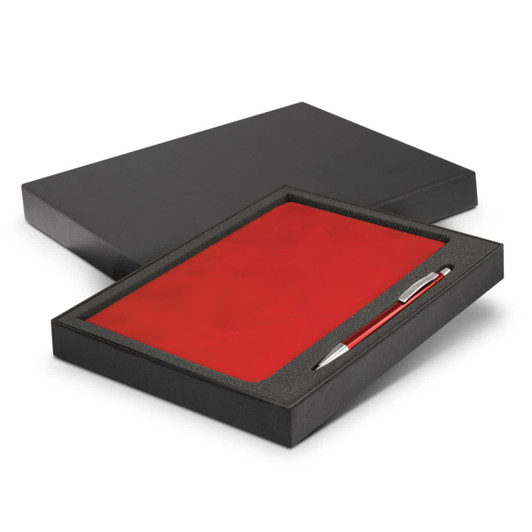 A red notebook and silver pen set presented in a black gift box.