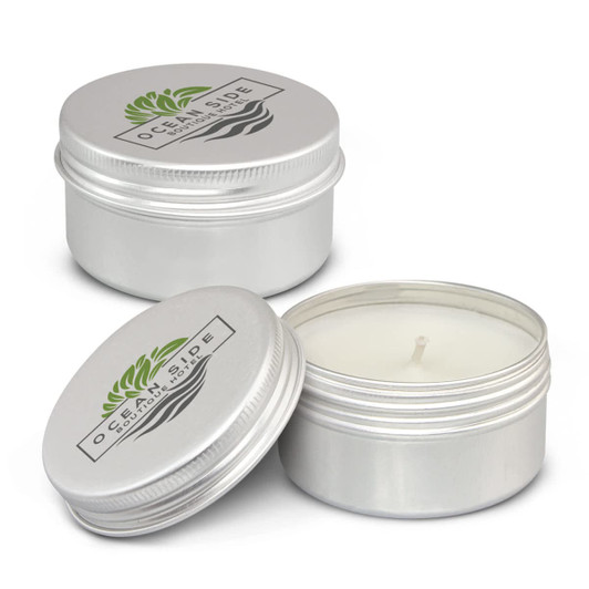 A silver citronella candle in a small tin container, featuring a lid and a simple logo on top.