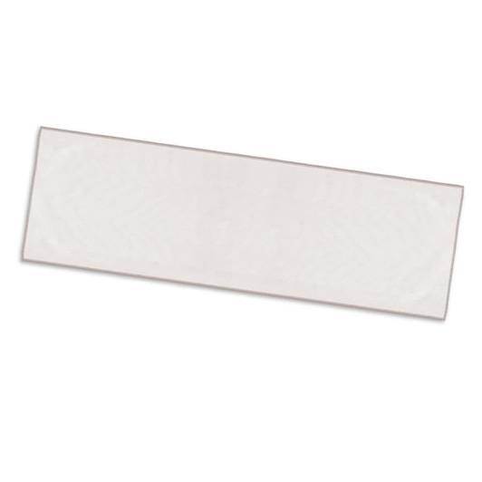 A light-coloured sports towel with a bordered edge, featuring a logo on one side.