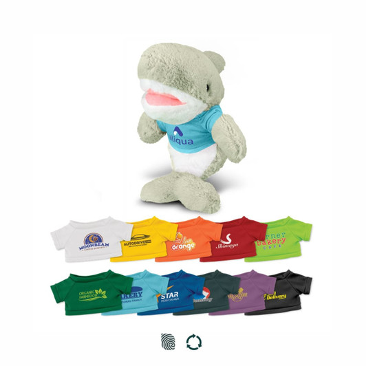 A light green shark plush toy wearing a blue shirt, with various colourful shirts displayed below.