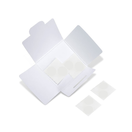 A white packaging box open to reveal circular stickers inside. The box has a logo on it.