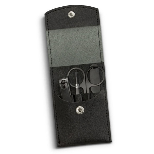 A black leather manicure set containing scissors, nail clippers, and a file, stored in a compact case with a snap closure.