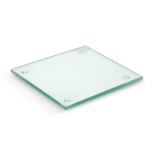 A square glass coaster with a frosted finish and rounded corners, featuring rubber feet on the underside.