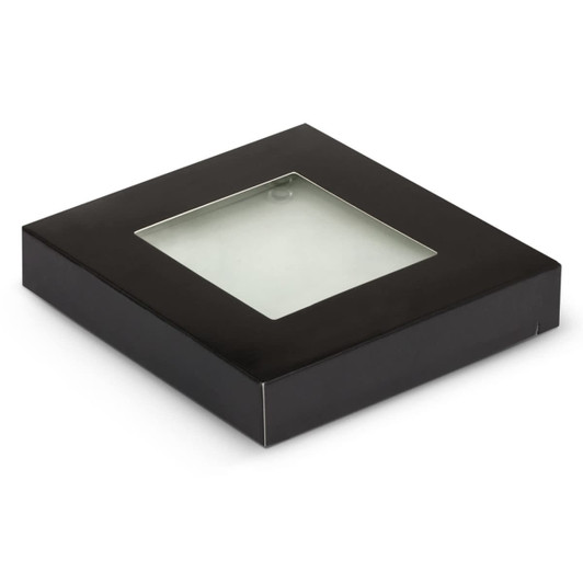 A square black box with a transparent window, containing a glass coaster set.