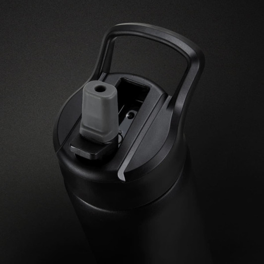 A drink bottle in matte black featuring a spout and a sturdy handle, with a logo on the side.