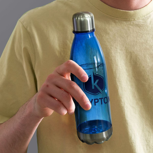 A drink bottle in blue with a metallic silver cap held by a person, featuring a logo on the front.