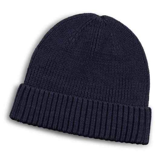 A navy blue merino wool beanie with a ribbed design and a folded cuff. It features a small logo.