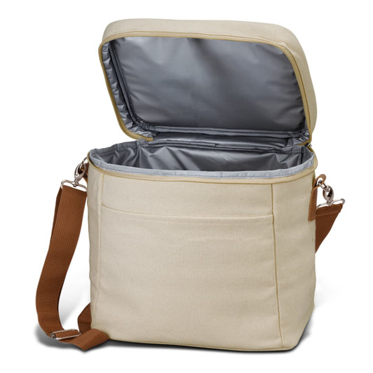A beige cooler bag with a grey insulated interior and a brown strap; it has an open top and a front pocket.