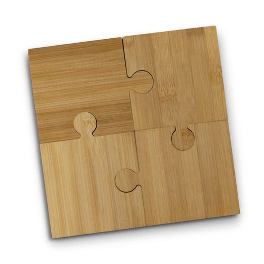 A set of four bamboo puzzle coasters in varying shades of light brown, featuring interlocking pieces.
