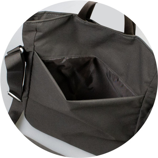 A dark grey crossbody bag with an adjustable strap and an outer pocket. It has a brand logo.