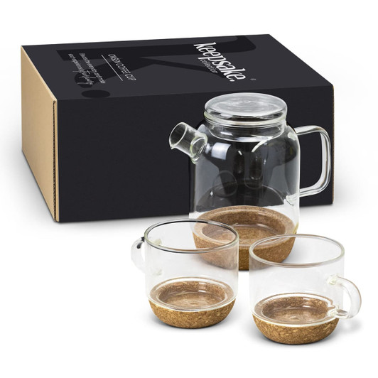 A glass tea set featuring a teapot and two matching cups with cork bases, presented in a box.