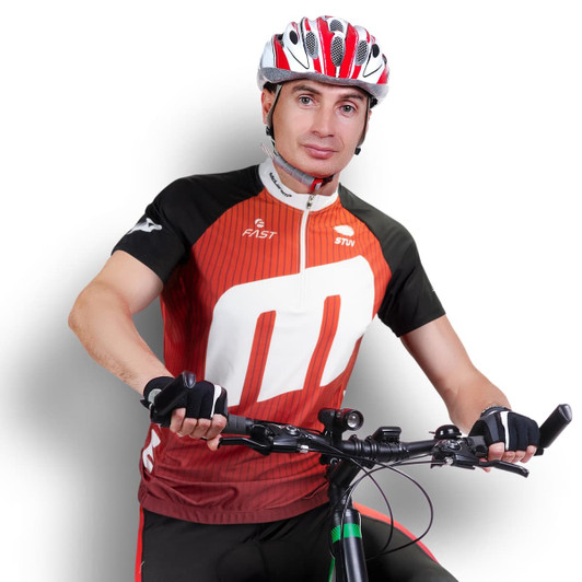A male cyclist wearing a red and black custom cycling jersey and a helmet, positioned on a bicycle. The jersey features a logo.