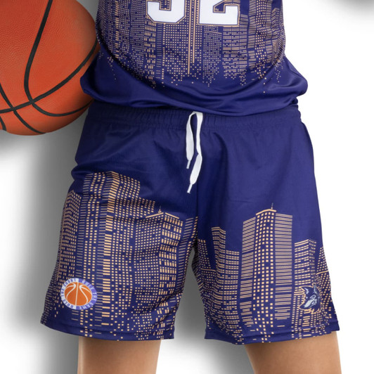 Custom women's basketball shorts in navy blue featuring a city skyline design and a basketball logo.