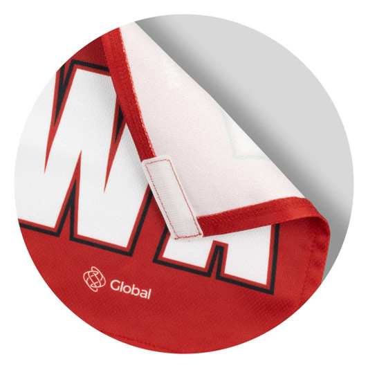A red and white custom women's netball bib featuring a logo and a smooth fabric finish.