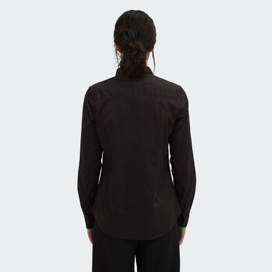 A women's black button-up poplin shirt featuring long sleeves and a fitted design, with a simple logo on the back.
