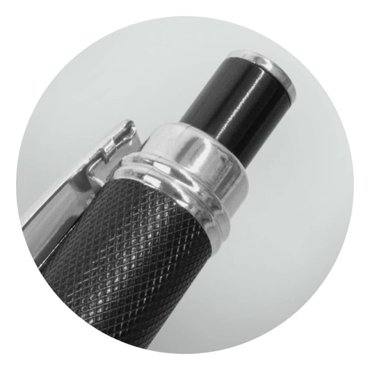 A metal Guilloche pen in black, featuring a textured grip and a silver accent. The pen has a sleek design and a logo.