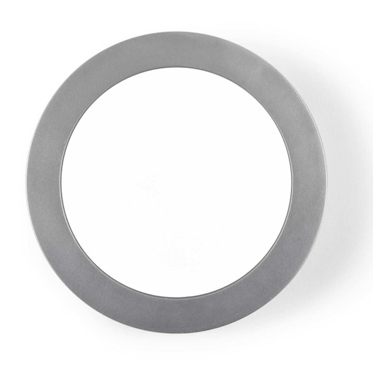 A sleek, circular aluminium wireless charger with a smooth surface, designed for fast charging of compatible devices.