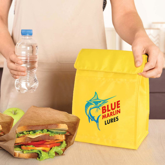 A yellow cooler lunch bag with a logo, accompanied by a drink bottle and two sandwiches in brown paper.