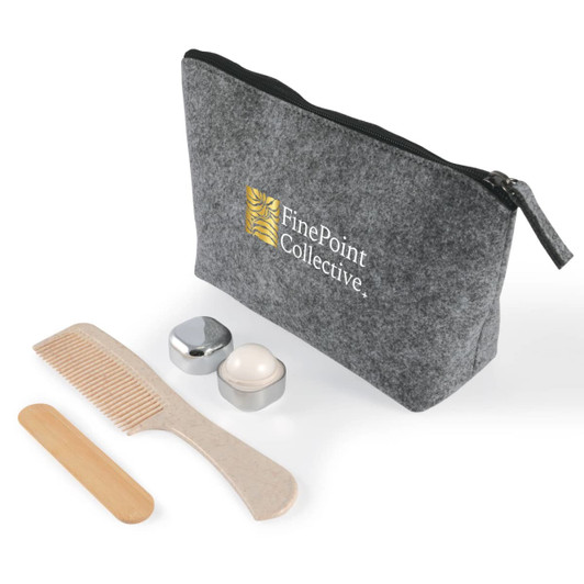 A grey toiletry bag with a zip, containing a comb, wooden stick, and two containers. The bag features a logo.