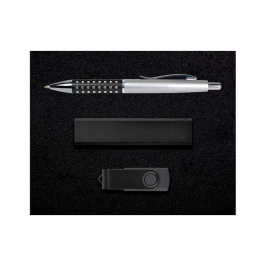 A gift set featuring a sleek pen with decorative accents, a compact USB flash drive, and a stylish box for presentation.