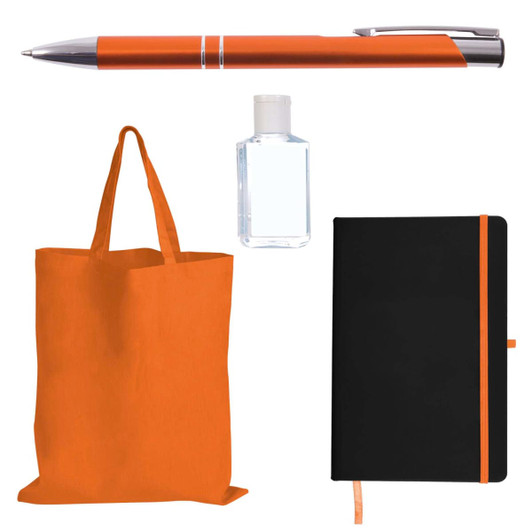 An orange tote bag, an orange pen, a small clear bottle, and a black notebook with an orange elastic closure.