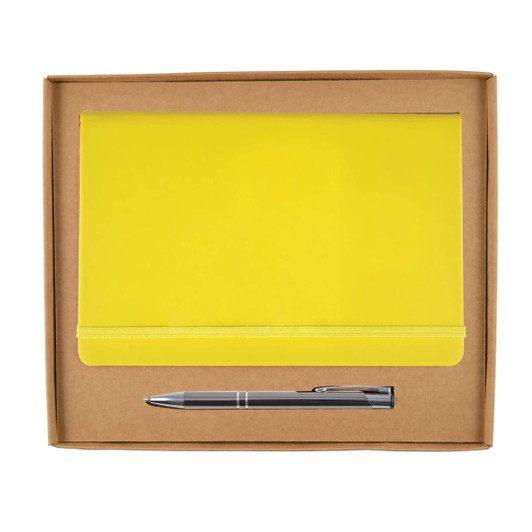 A yellow notebook with an elastic band and a silver pen are presented in a cardboard gift box.