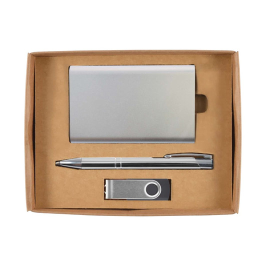 A gift set featuring a silver card holder, a silver pen, and a silver USB drive, all presented in a cardboard box.